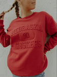 University of Nebraska Vintage 81 Emboss - Comfort Crewneck in True Red