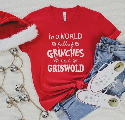 In a World full of Grinches, be a Griswold Tee in Heather Red